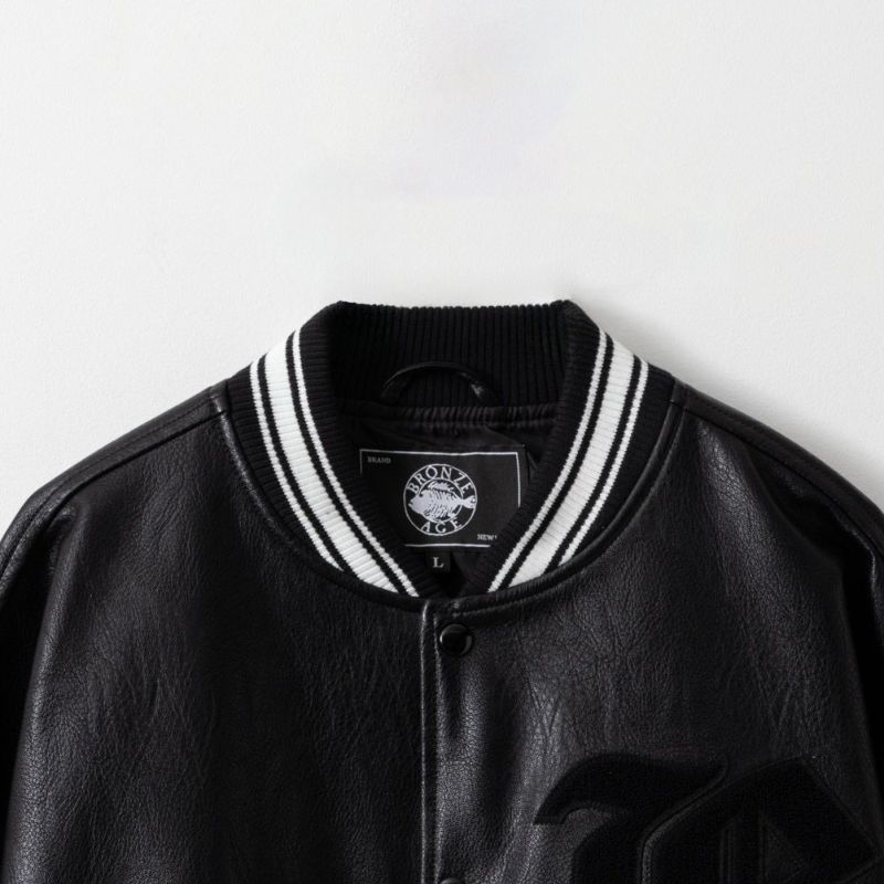 BRONZE AGE Bロゴサガラスタジアムジャケット メンズ