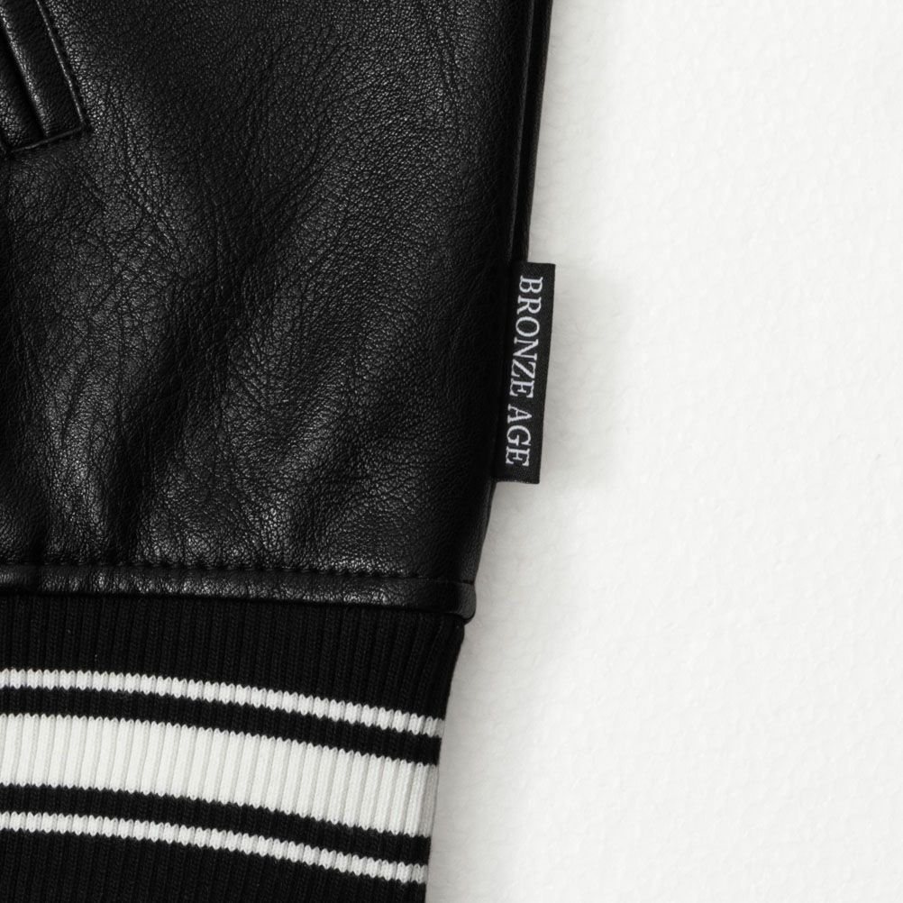 BRONZE AGE Bロゴサガラスタジアムジャケット メンズ