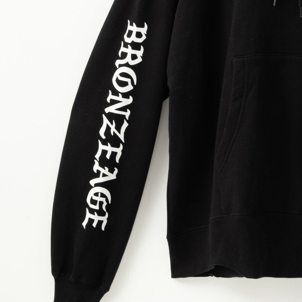 BRONZE AGE ハンドロゴビッグパーカー メンズ