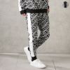 [期間限定価格]【オンラインストア限定】GIANNI VALENTINO ポンチ素材 総柄ジョガーパンツ メンズ商品サムネイル-1