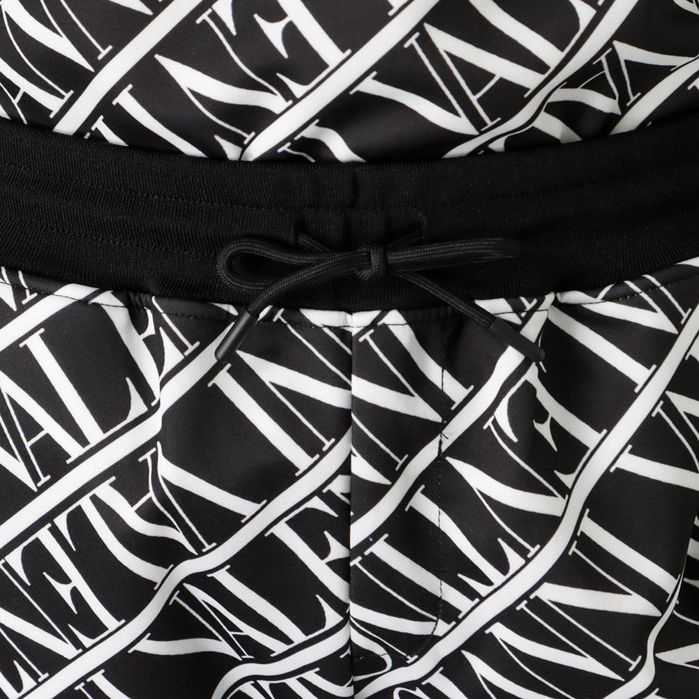 GIANNI VALENTINO ポンチ素材 総柄ジョガーパンツ メンズ