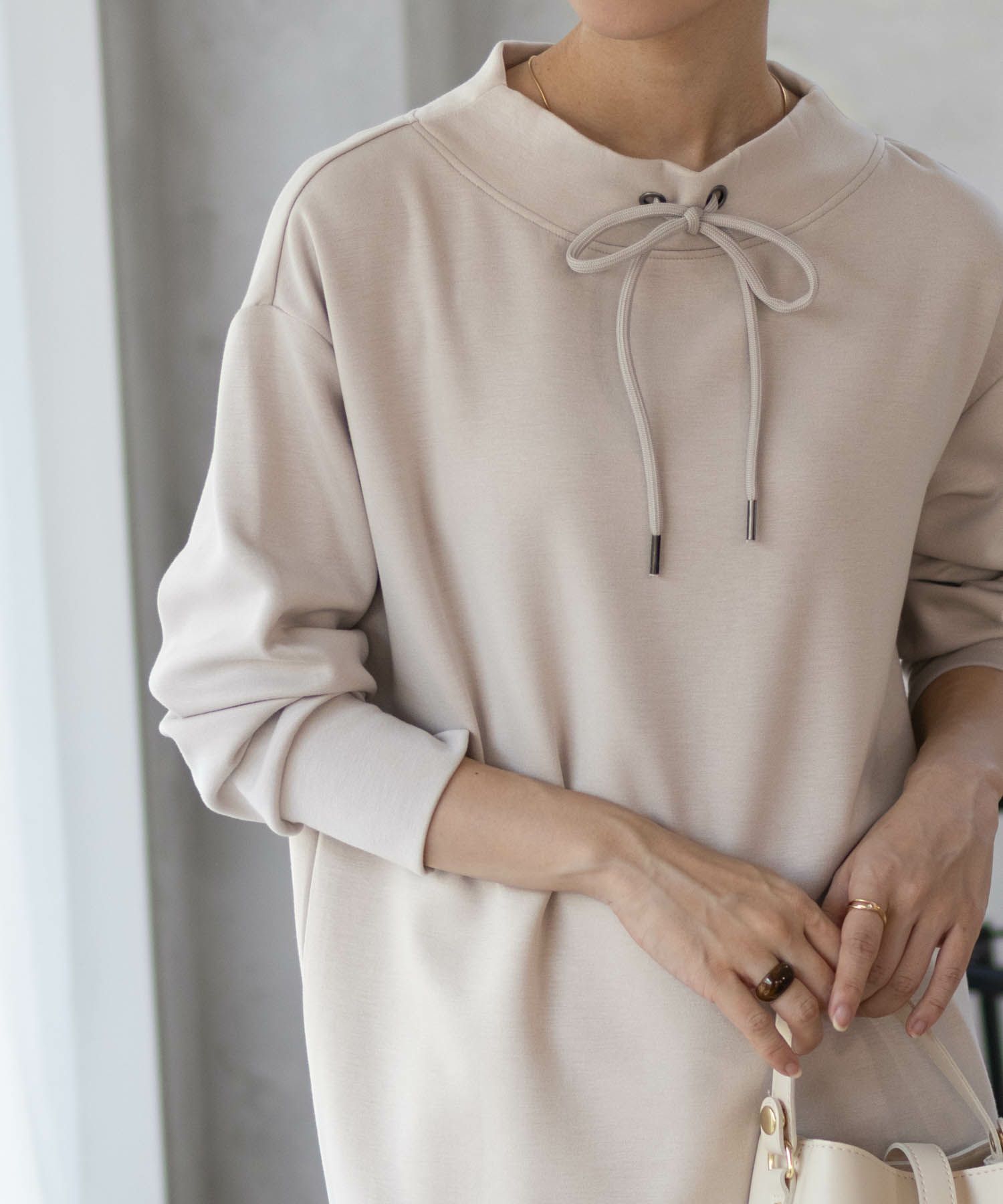 URBAN COLLECTION ポンチ素材 裾レイヤードプルオーバー レディース