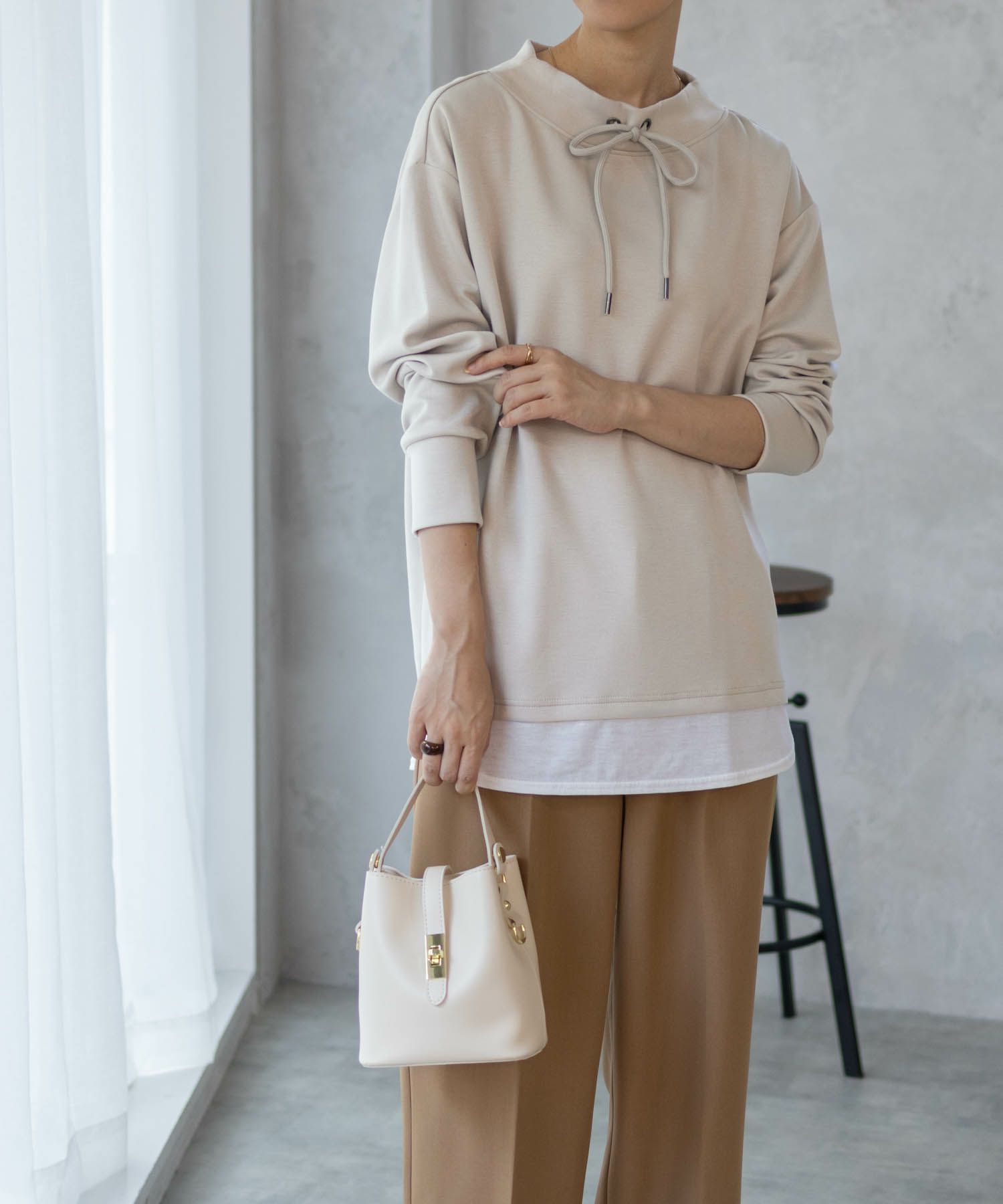 [期間限定価格]URBAN COLLECTION  ポンチ素材 裾レイヤードプルオーバー レディース商品サムネイル-2