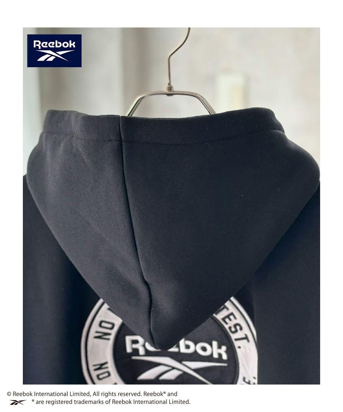 Reebok 裏起毛サークルロゴパーカー メンズ