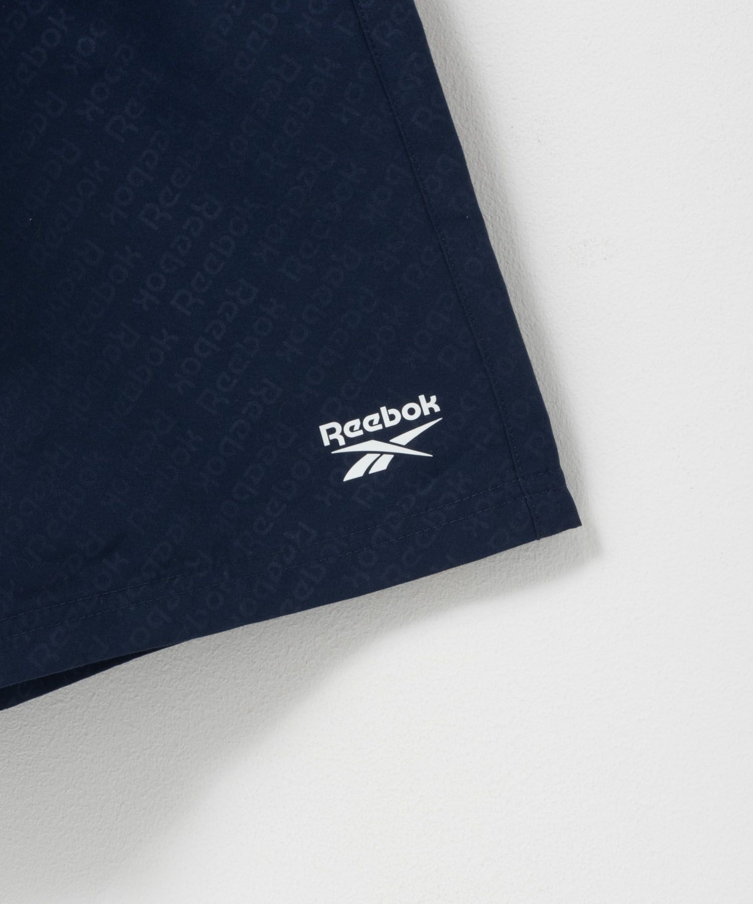Reebok エンボスサーフショートパンツ メンズ