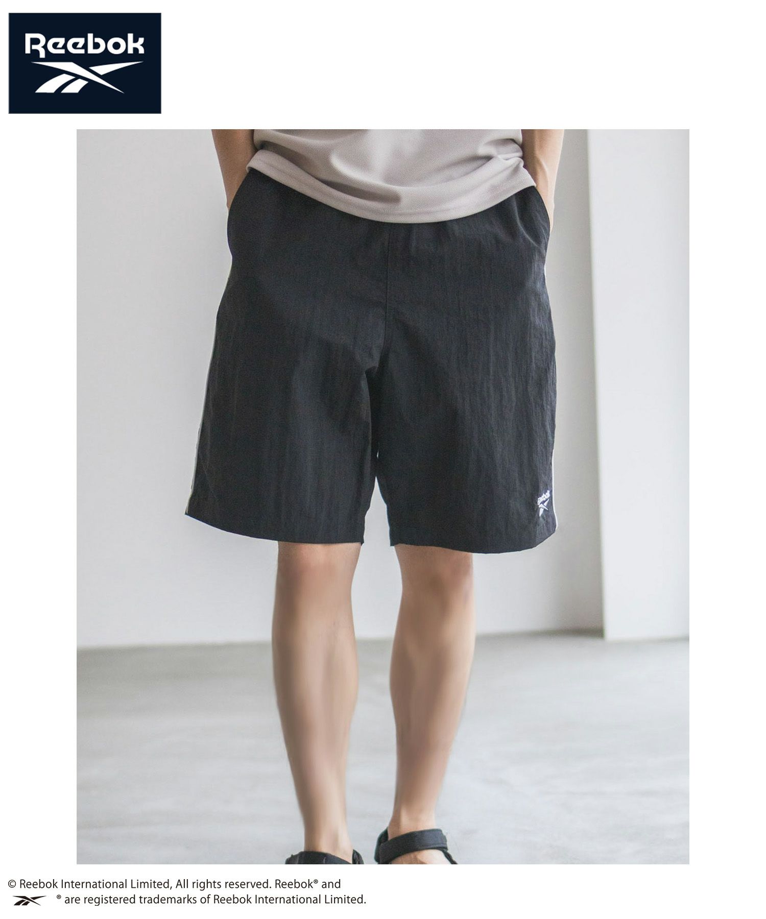 Reebok ナイロンパイピングショートパンツ メンズ