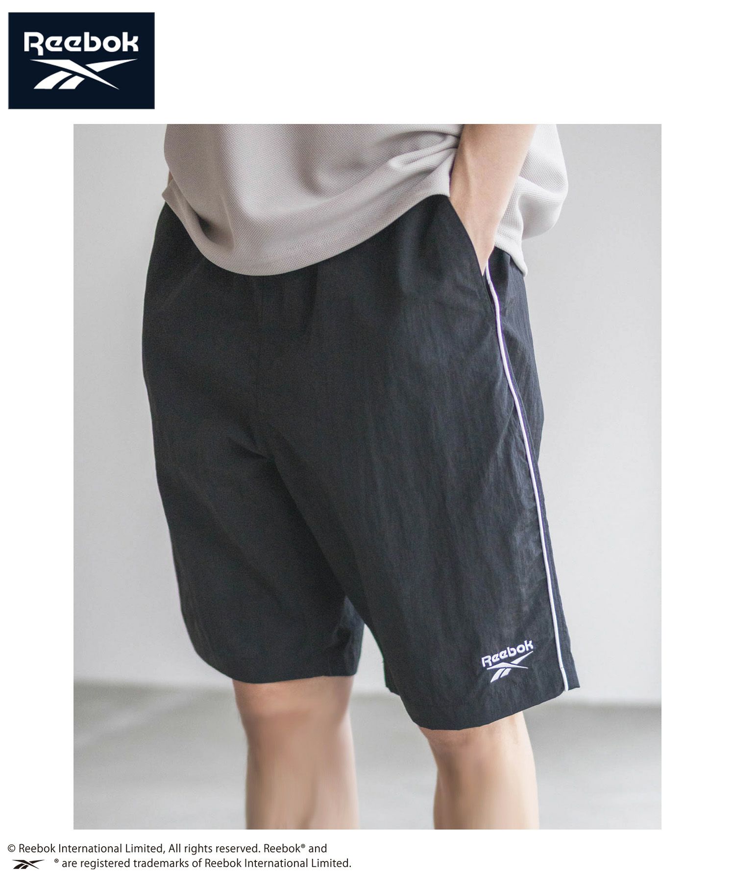 Reebok ナイロンパイピングショートパンツ メンズ