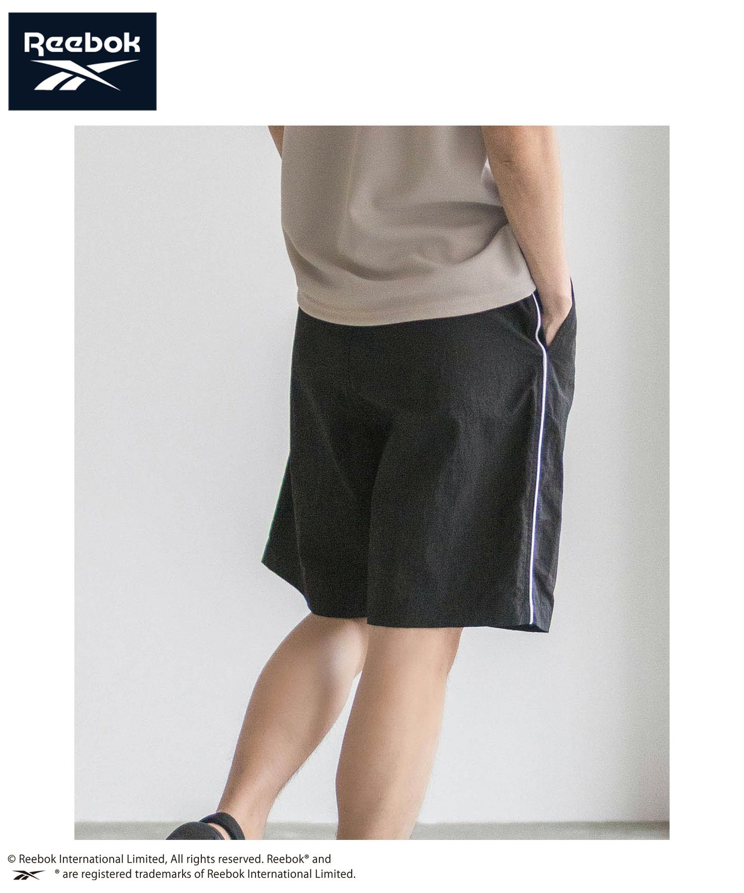 Reebok ナイロンパイピングショートパンツ メンズ