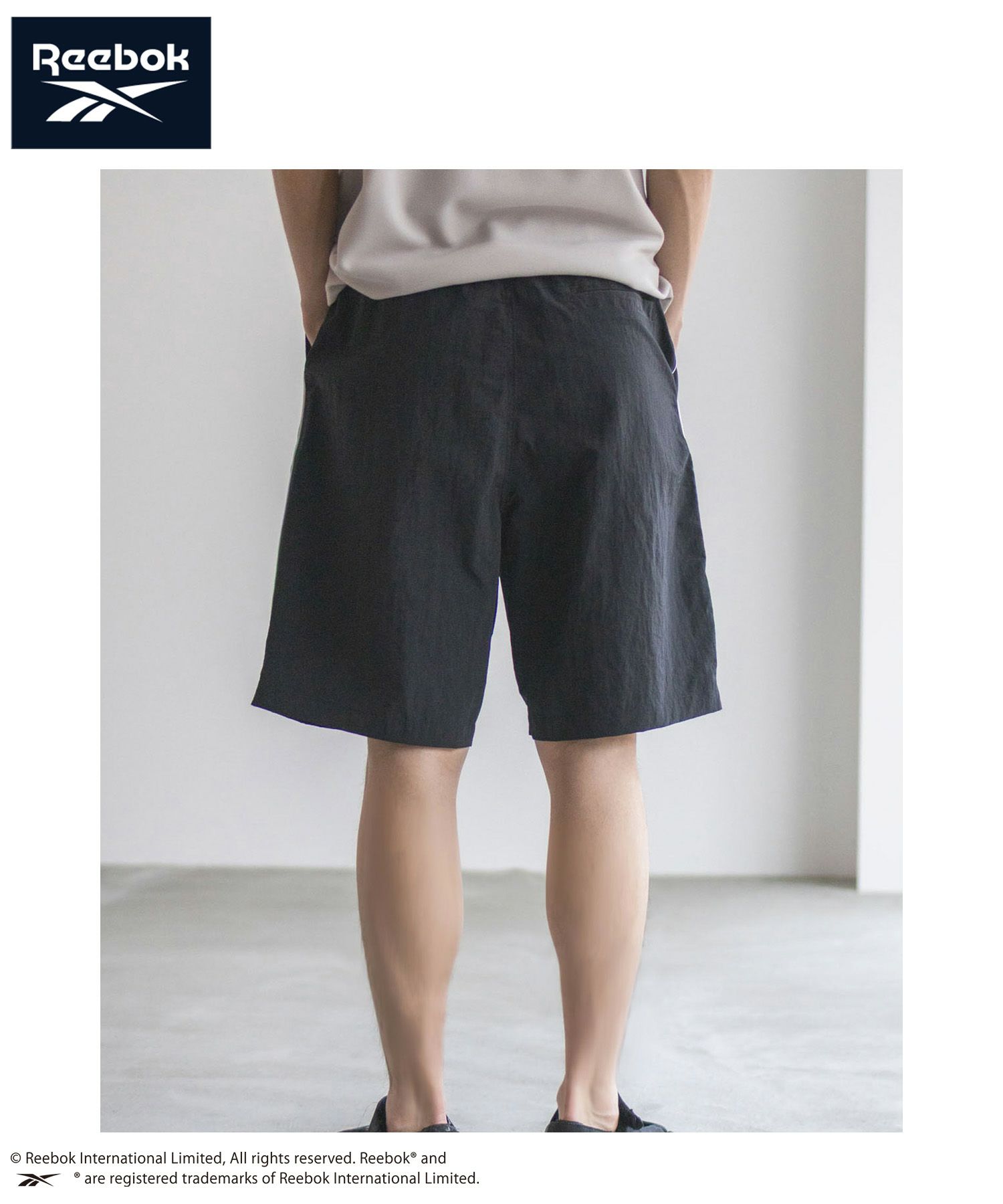 Reebok ナイロンパイピングショートパンツ メンズ