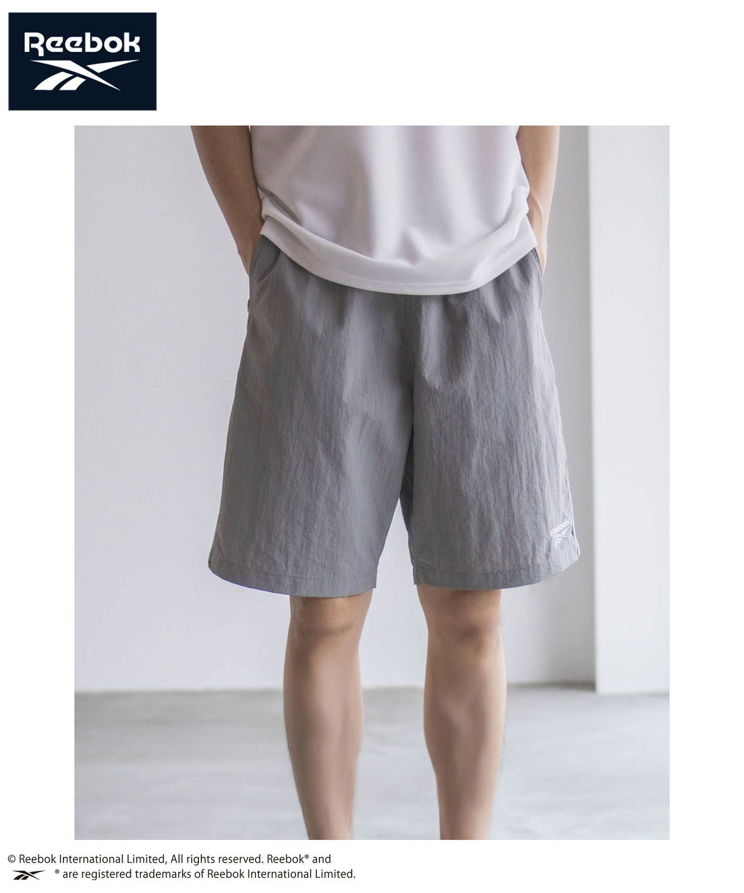Reebok ナイロンパイピングショートパンツ メンズ