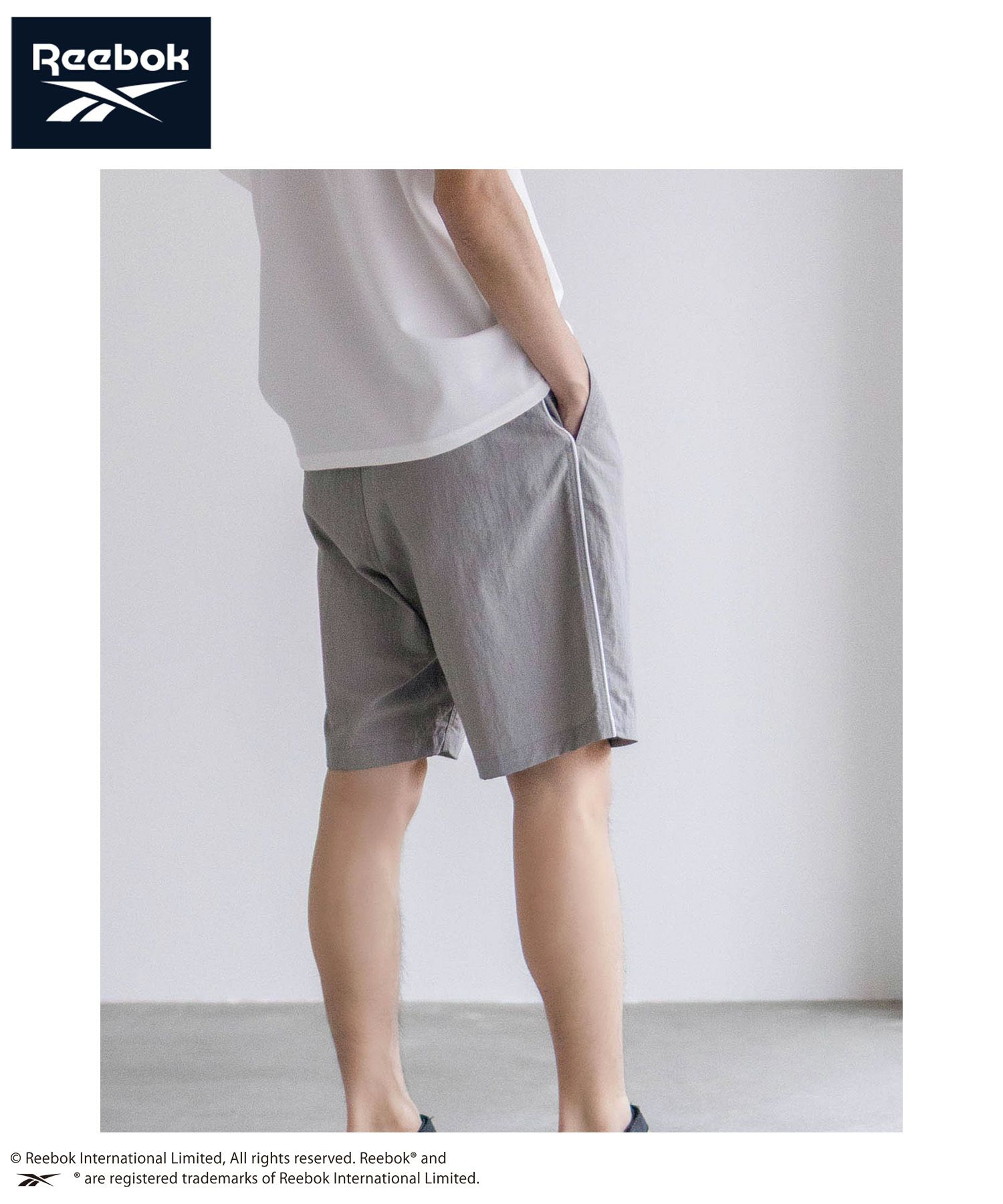 Reebok ナイロンパイピングショートパンツ メンズ