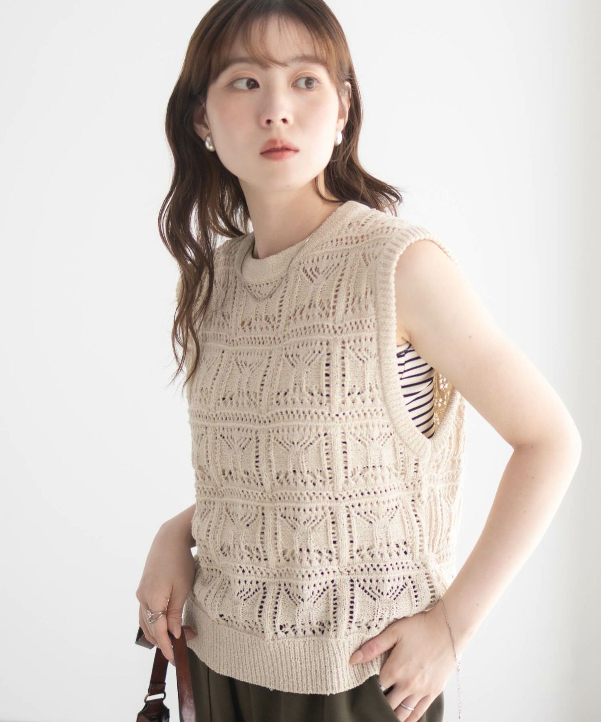 milli de l'air 幾何柄編みニットベスト レディース