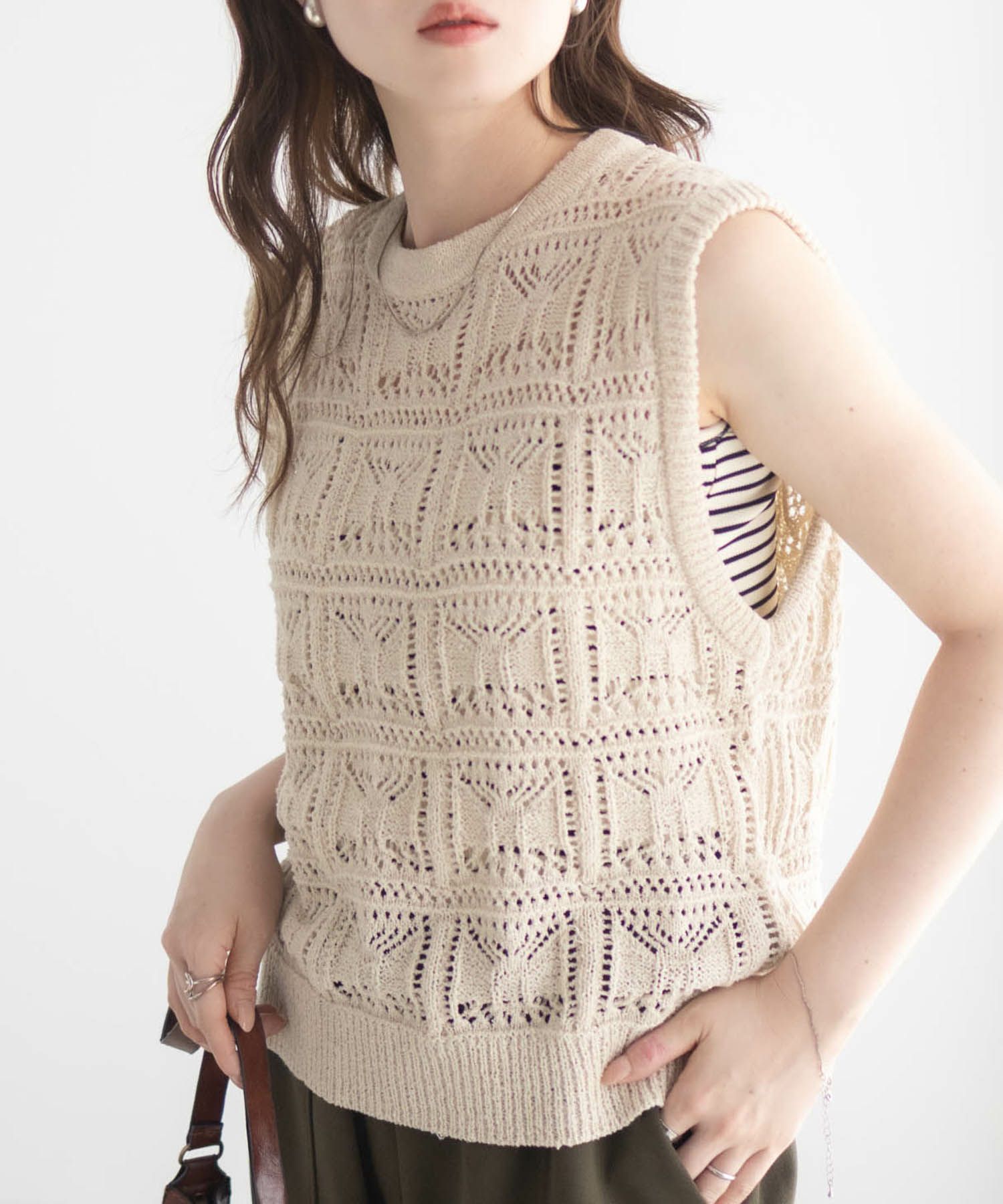 milli de l'air 幾何柄編みニットベスト レディース