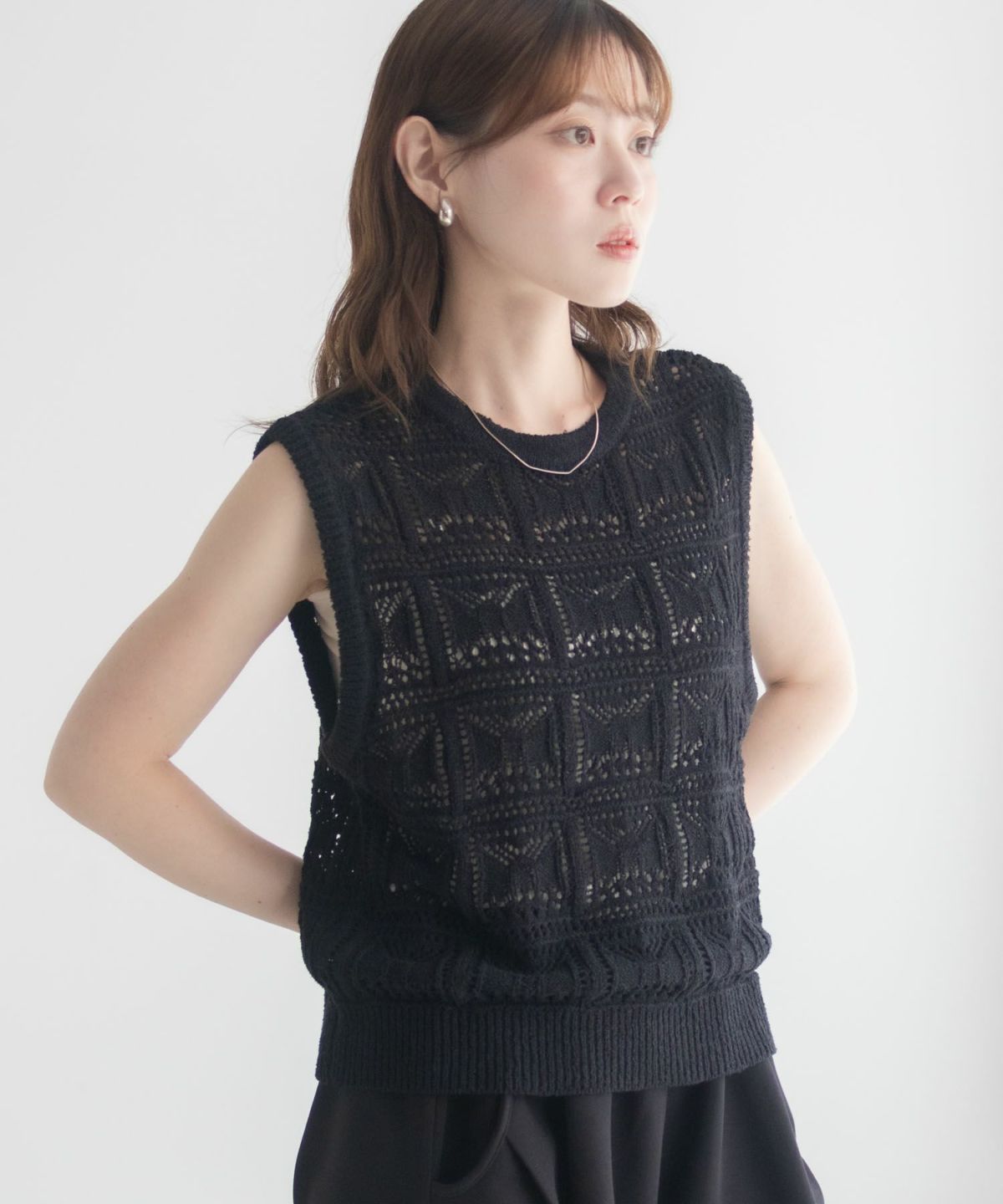 milli de l'air 幾何柄編みニットベスト レディース