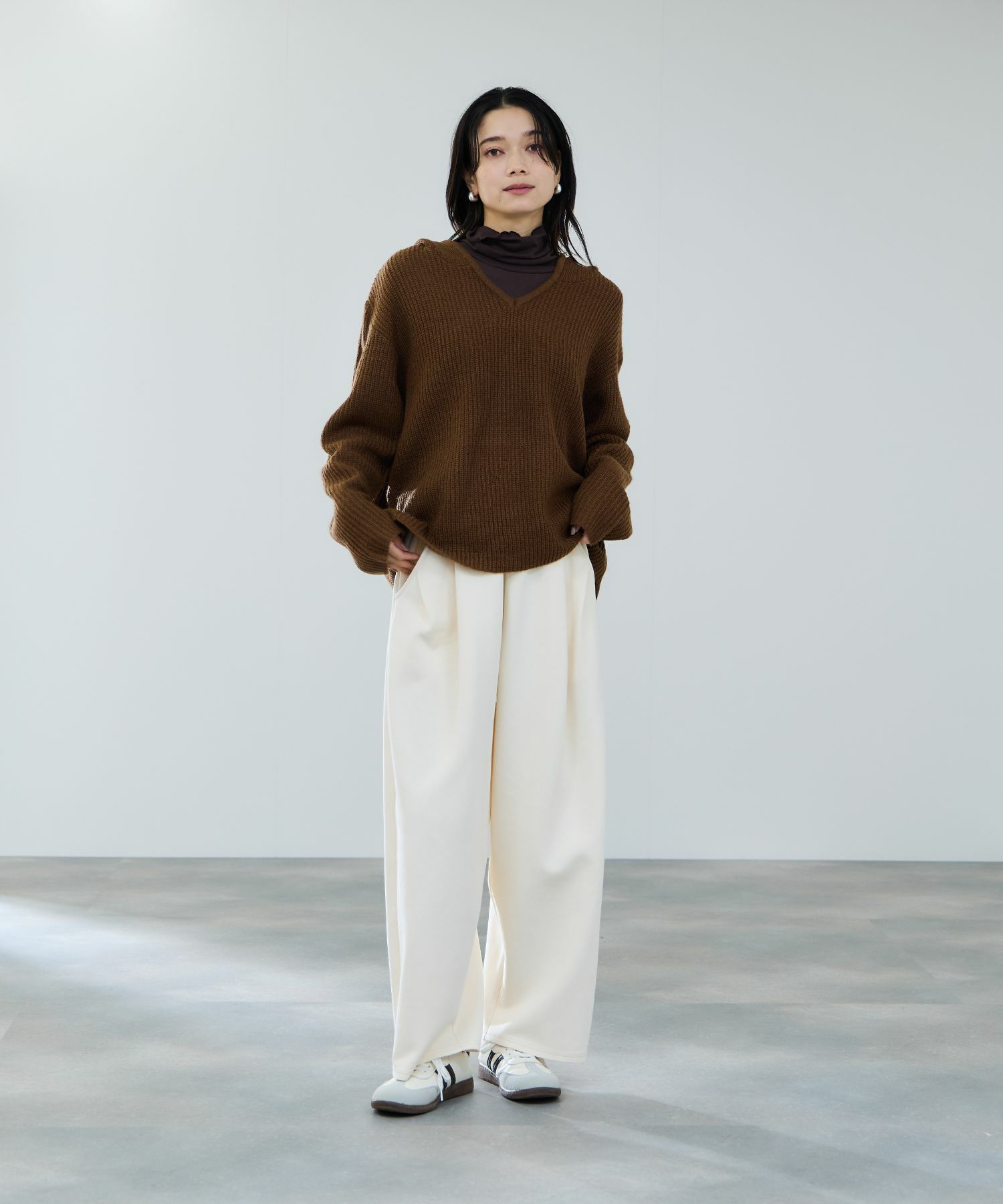 milli de l'air ポンチ素材 リラックスカーブパンツ レディース