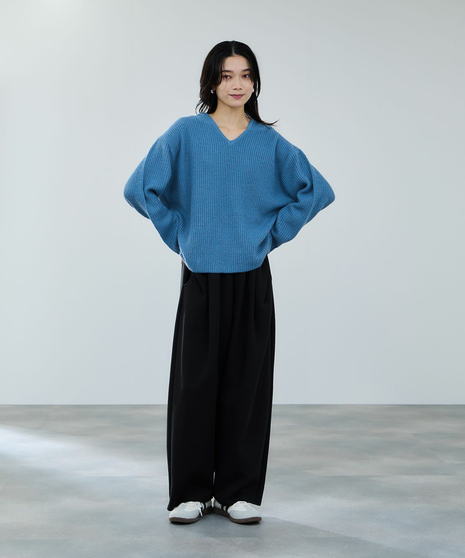 milli de l'air ポンチ素材 リラックスカーブパンツ レディース