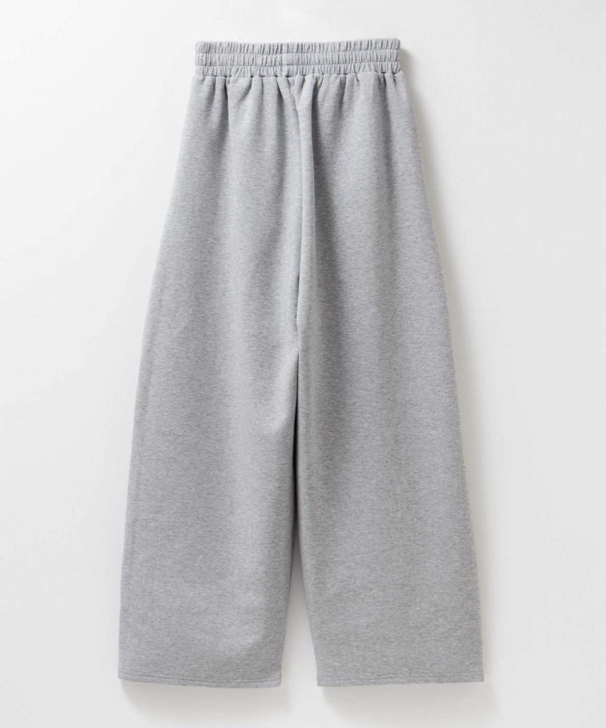 milli de l'air ポンチ素材 リラックスカーブパンツ レディース