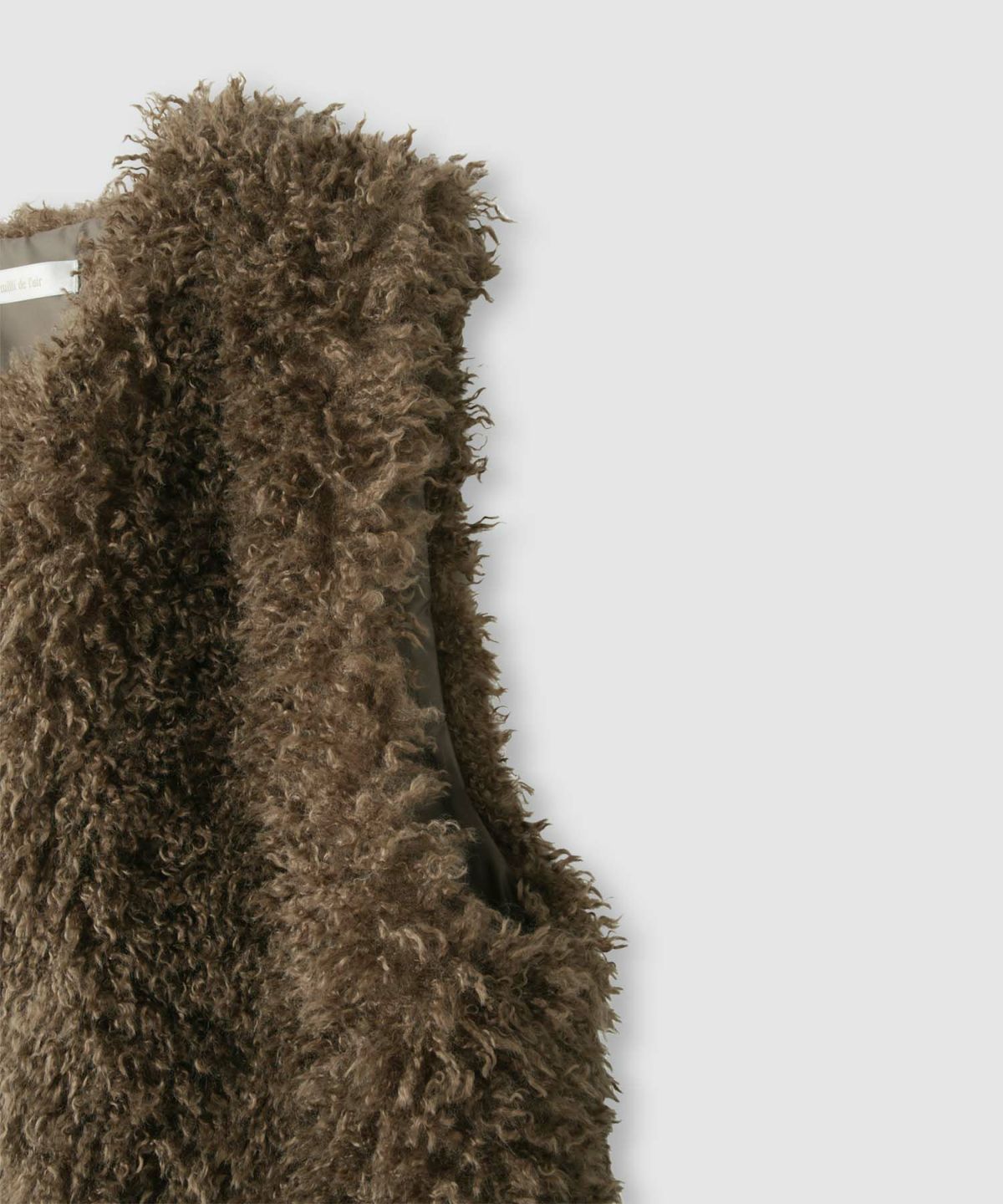 milli de l'air リンクルフェイクファーベスト レディース