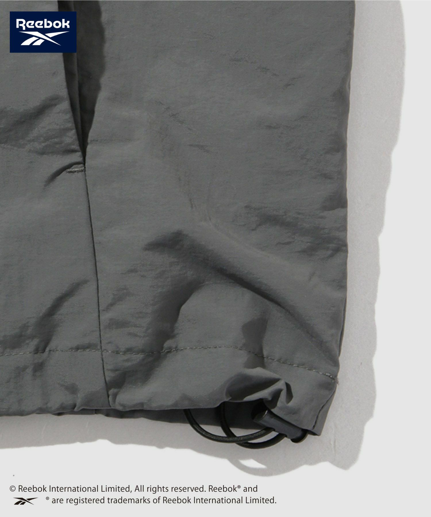 【WEB限定】Reebok  エンブレムナイロンアノラックジャケット メンズ商品画像-8